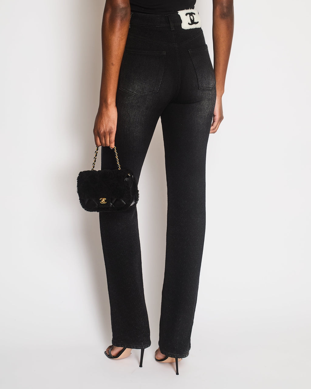 Chanel 24B Coco Neige Black Straight Leg High-Waisted Jeans with Back CC Shearling Logo Detailing and Silver Embellished Button Detail Size FR 34 (UK 6)