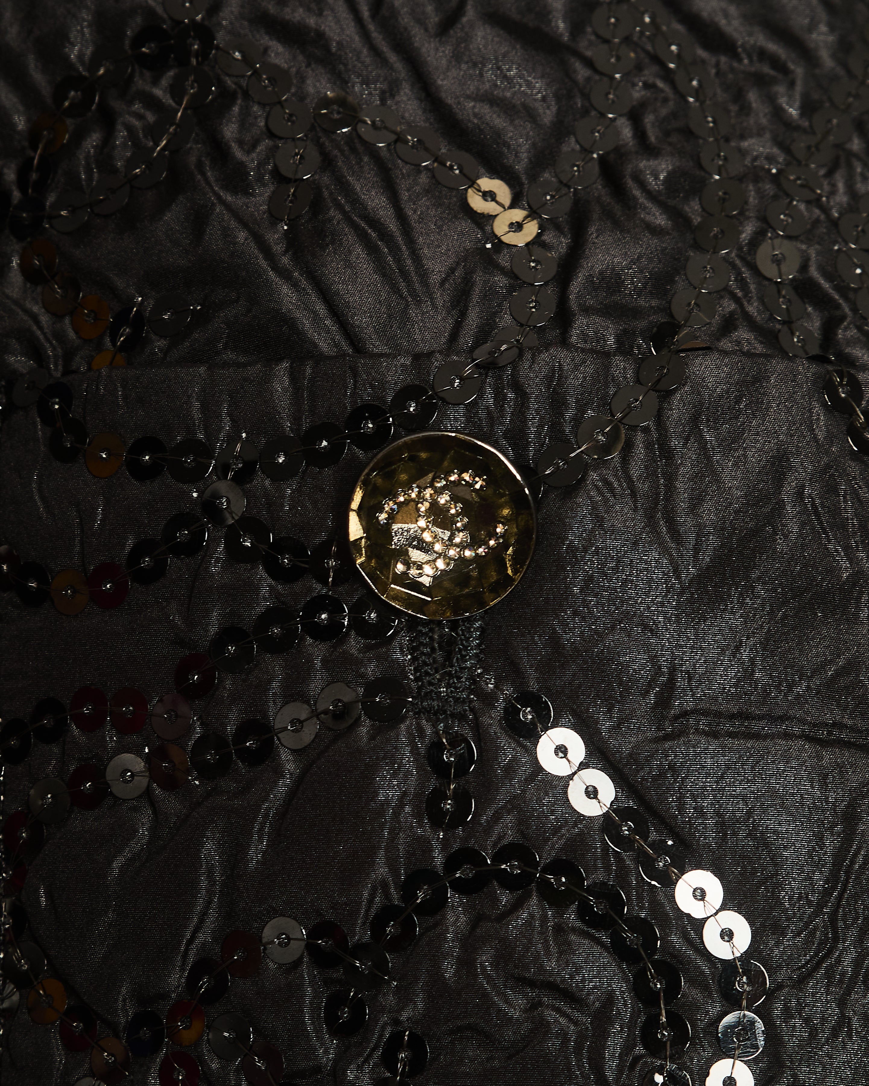 Chanel Black Padded Short-Sleeved Mini Dress with Sequin Camellia Embroideries and Front Pockets with Crystal CC Logo Buttons Size FR 38 (UK 10