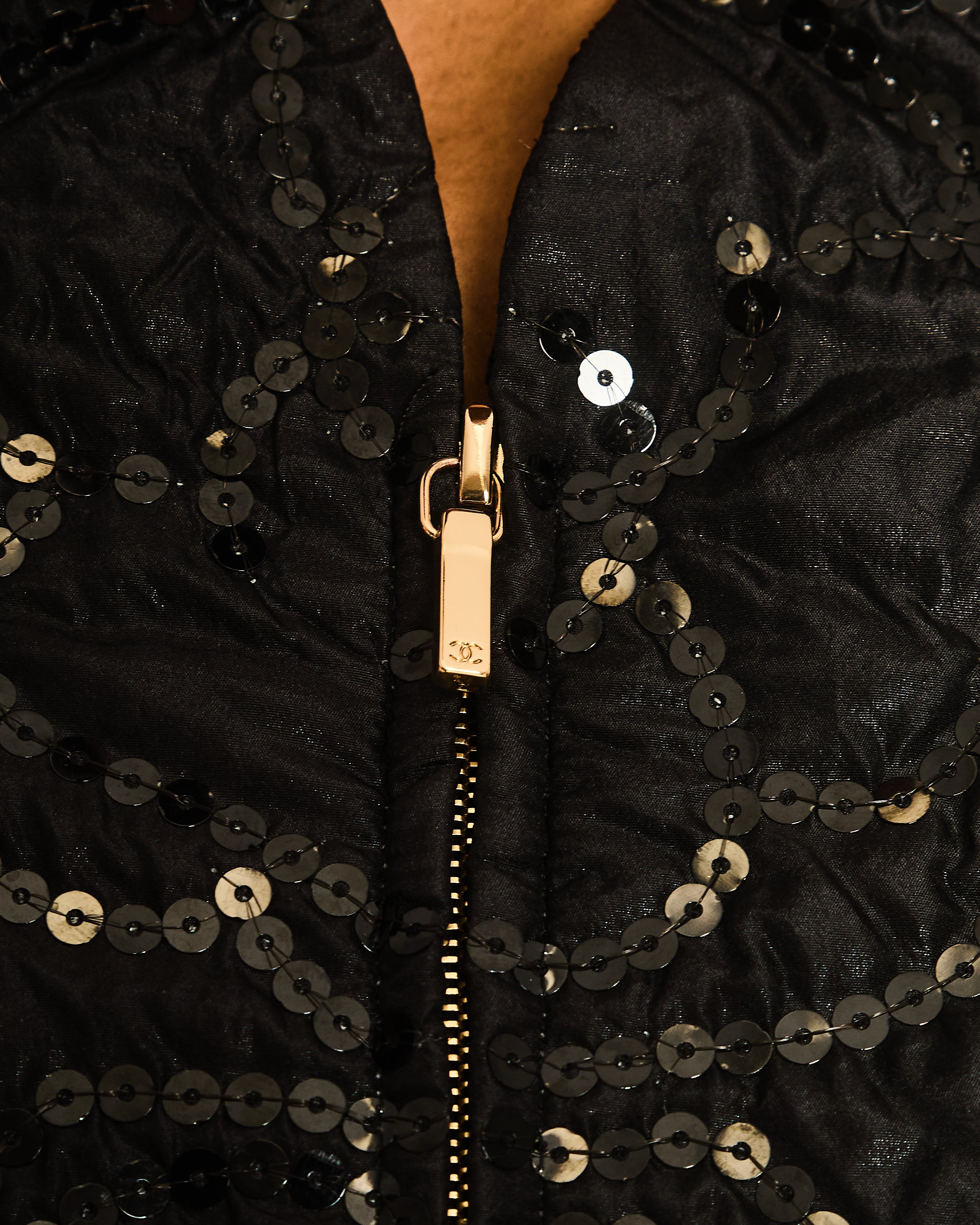 Chanel Black Padded Short-Sleeved Mini Dress with Sequin Camellia Embroideries and Front Pockets with Crystal CC Logo Buttons Size FR 38 (UK 10