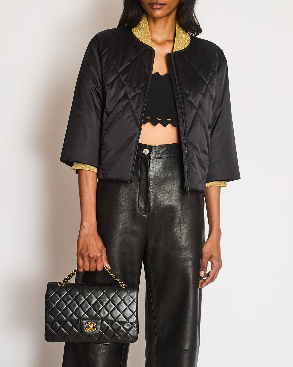 Chanel 17A Black Quilted Cropped Puffer Jacket with Gold Cuffs and Black CC Logo Zipper Size FR 36 (UK 8)