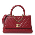 Chanel Aged Calfskin Chevron Quilted Mini Coco Handle Flap Red