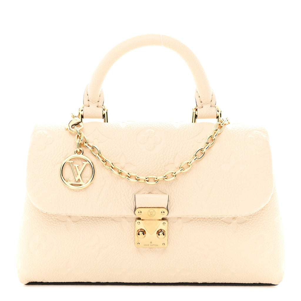 Louis Vuitton Empreinte Monogram Nano Madeleine Creme