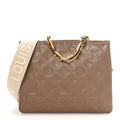 Louis Vuitton Lambskin Embossed Monogram Coussin PM Taupe