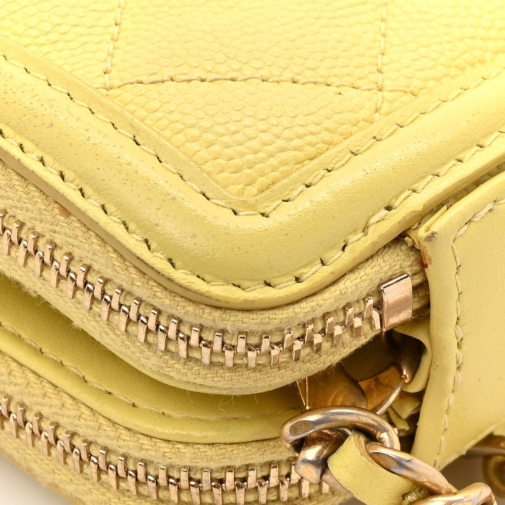 Chanel Caviar Quilted CC Filigree Clutch With Chain Yellow