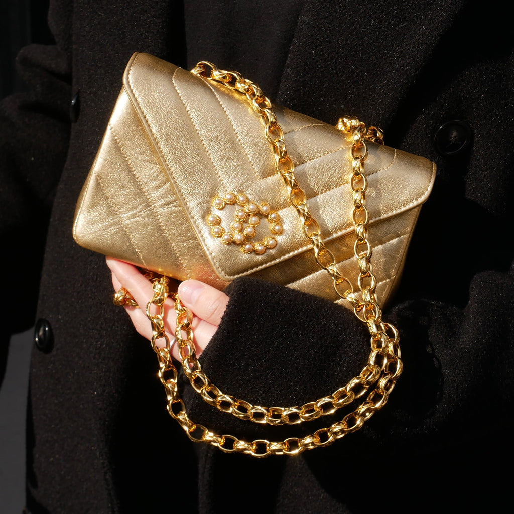 CHANEL 1991-1994 Gold Lambskin Chevron Faux Pearl CC Flap Bag