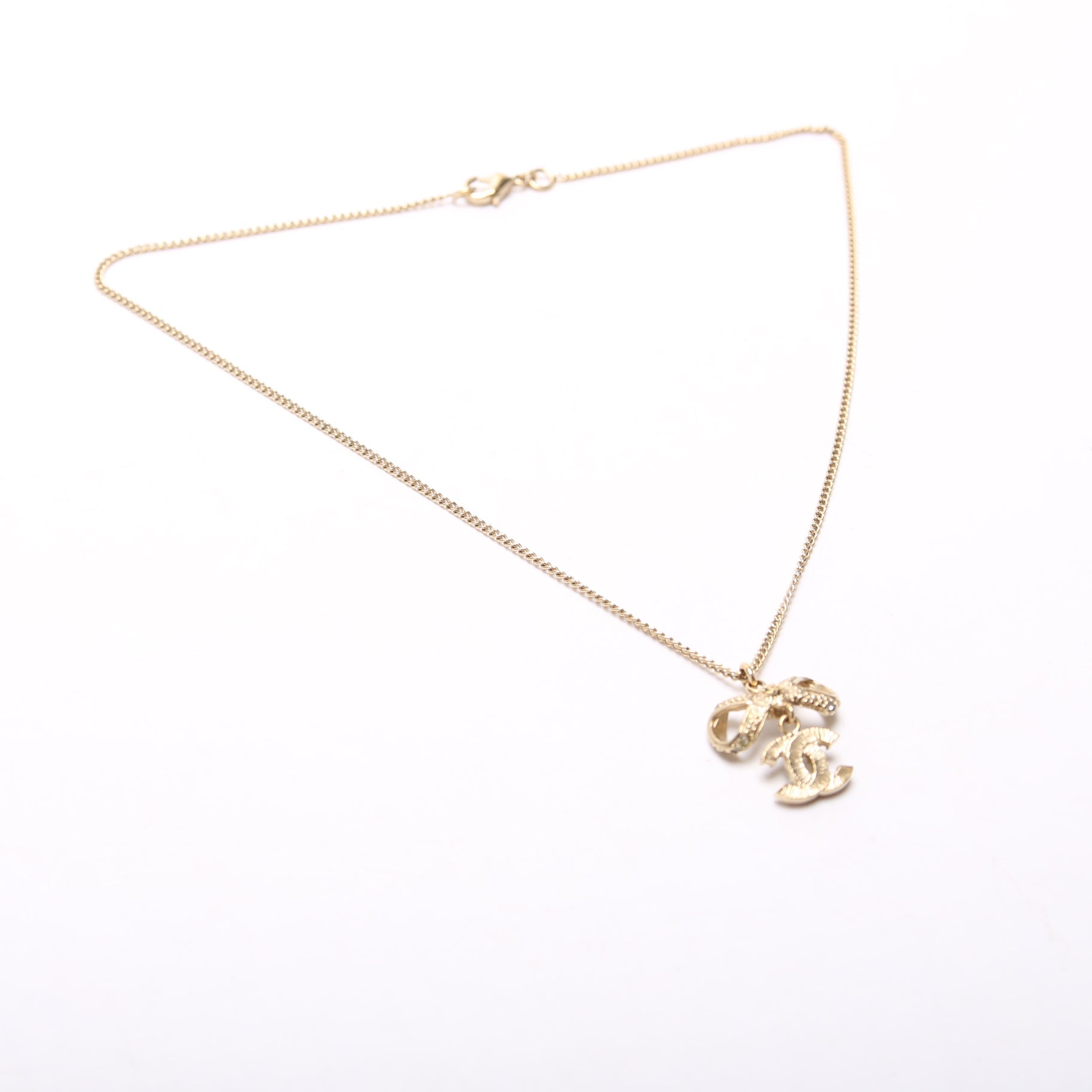 CC Bow Rhinestone Pendant