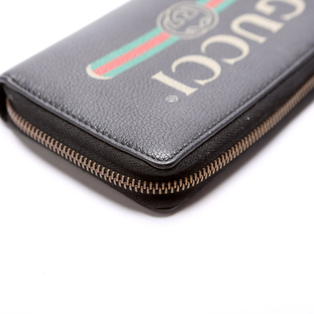 496317 Retro Logo Leather Zip Around Wallet
