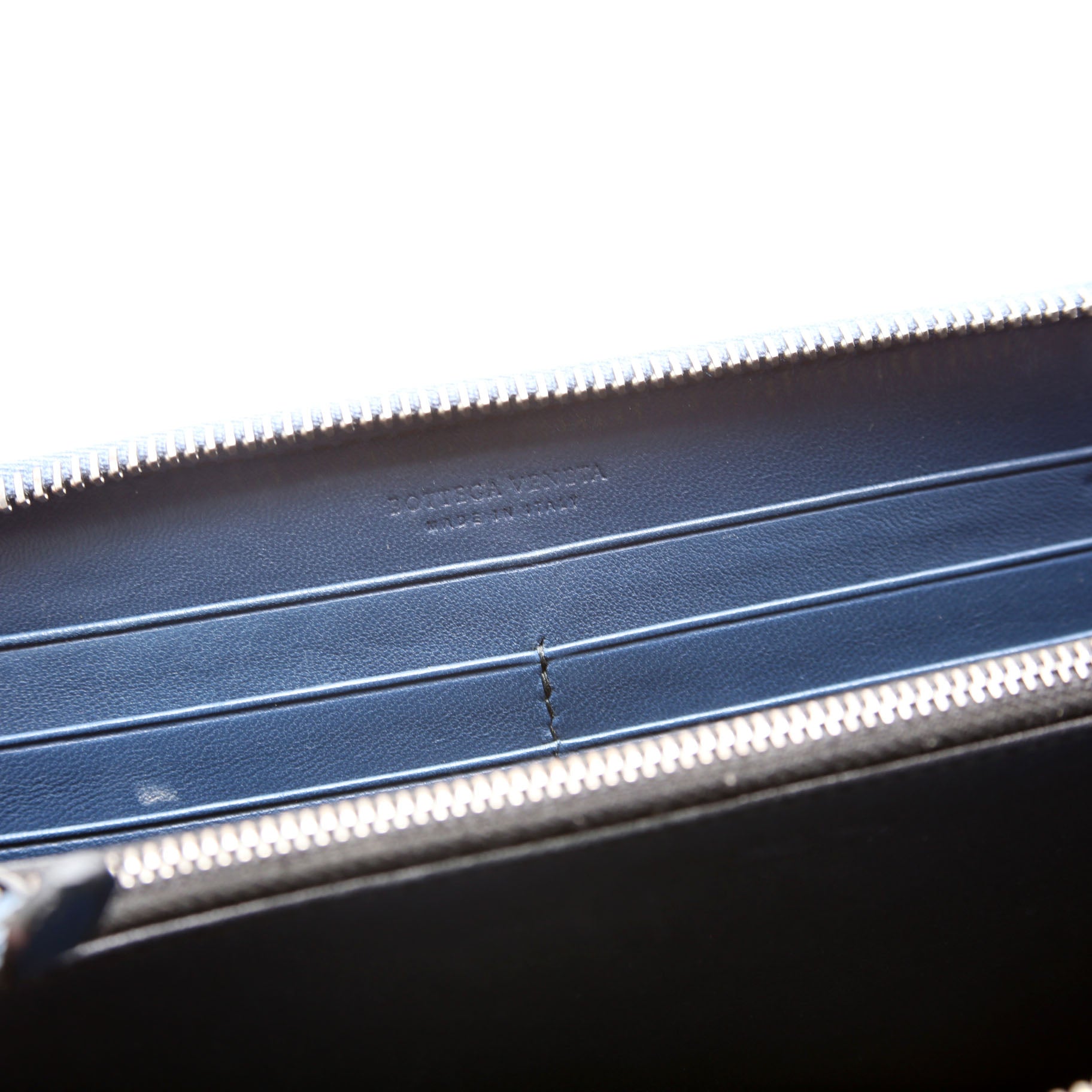 Intrecciato Double Stitched Zip Around Wallet