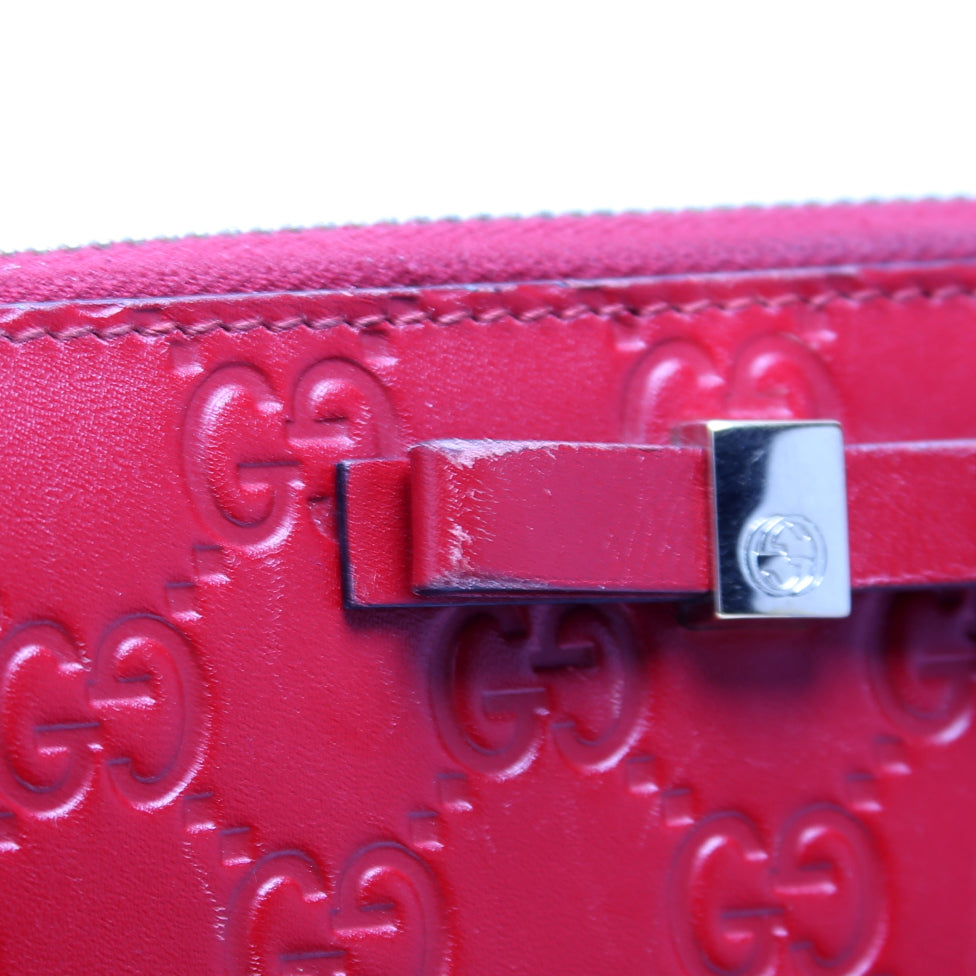 388680 Bow Zip Around Wallet Guccissima