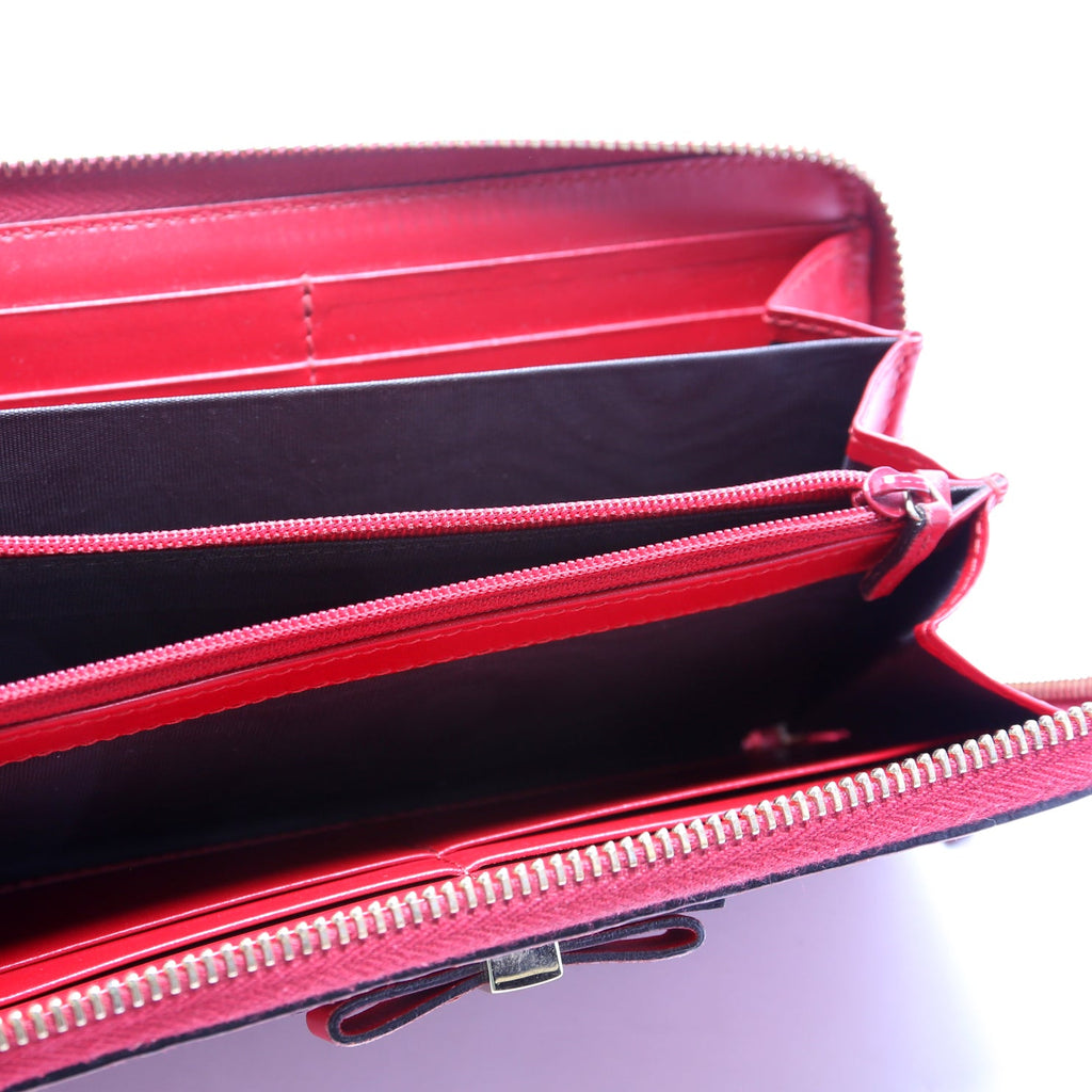 388680 Bow Zip Around Wallet Guccissima