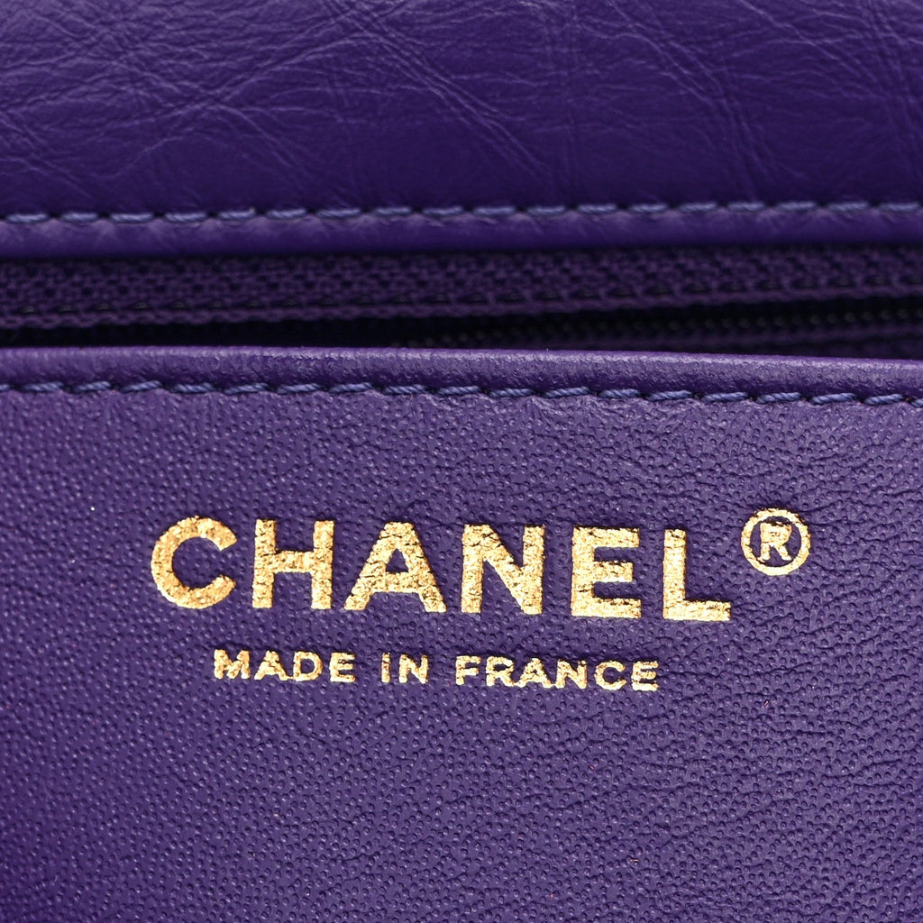 Chanel Aged Calfskin Quilted 2.55 Reissue Mini Flap Purple