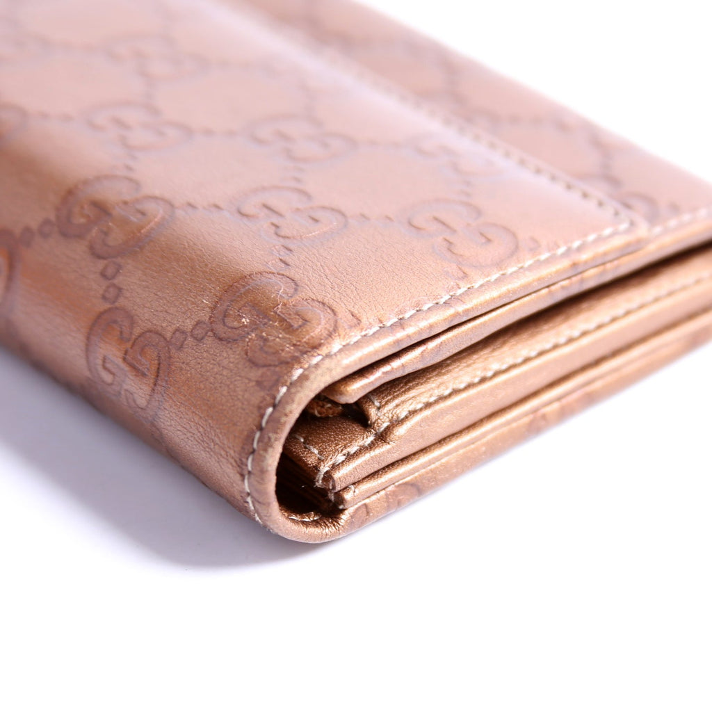 245728 Guccissima Lovely Heart Continental Wallet Bronze