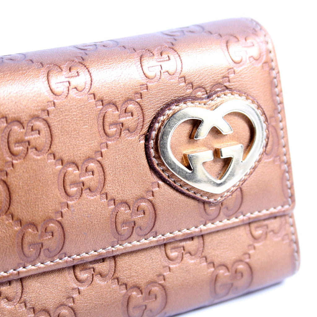 245728 Guccissima Lovely Heart Continental Wallet Bronze