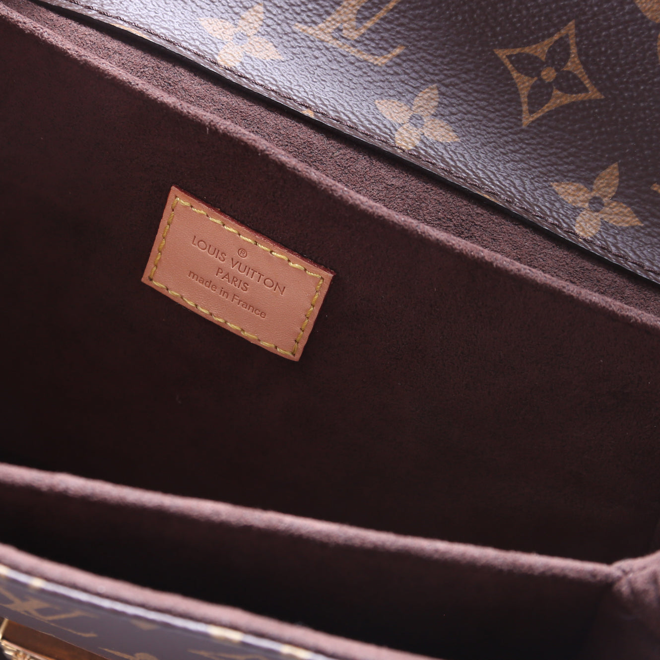 Pochette Metis Monogram