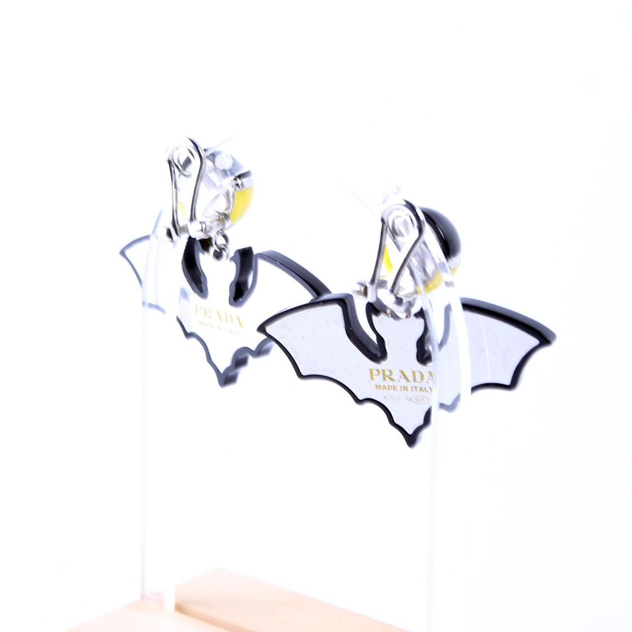 Prada Bat Clip-On Earrings 925 Black/Yellow