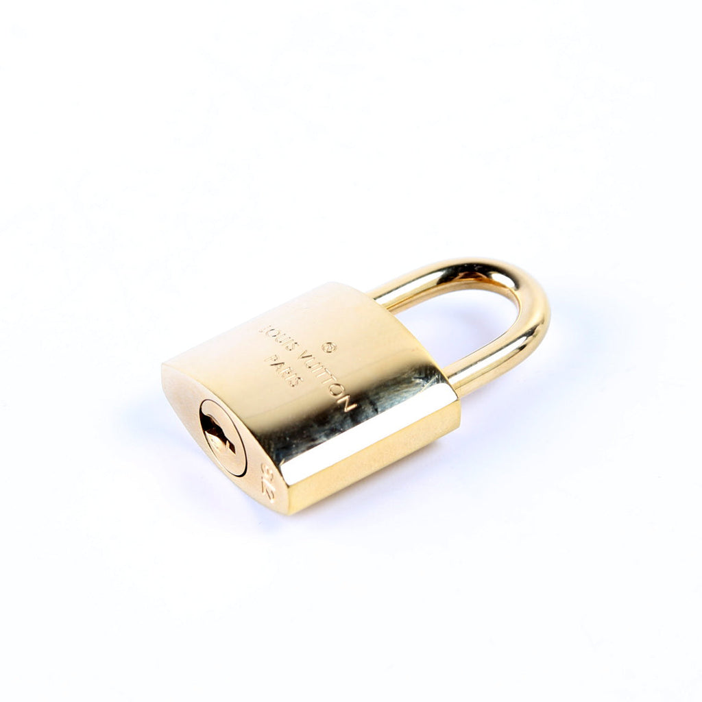Lock & Key Circle Logo Gold