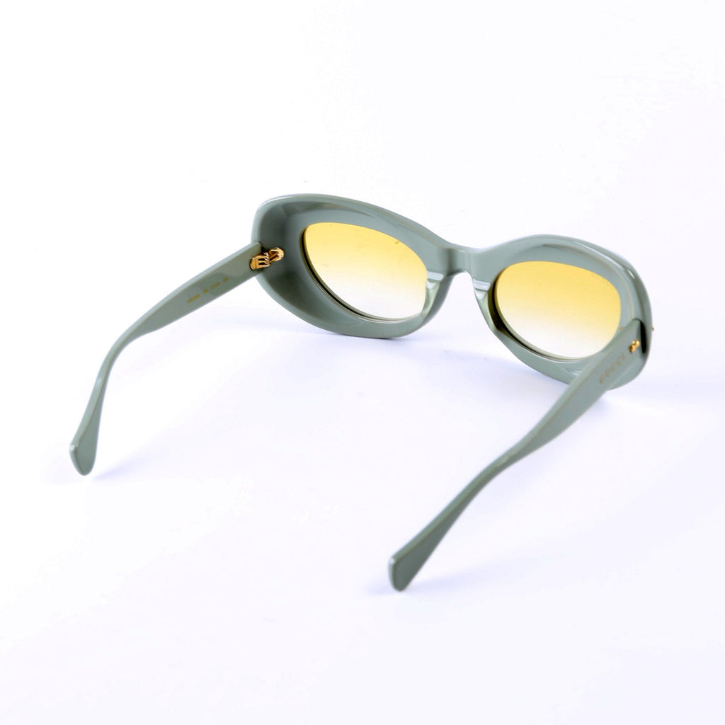 GG0990S 002 Cateye Sunglasses Green
