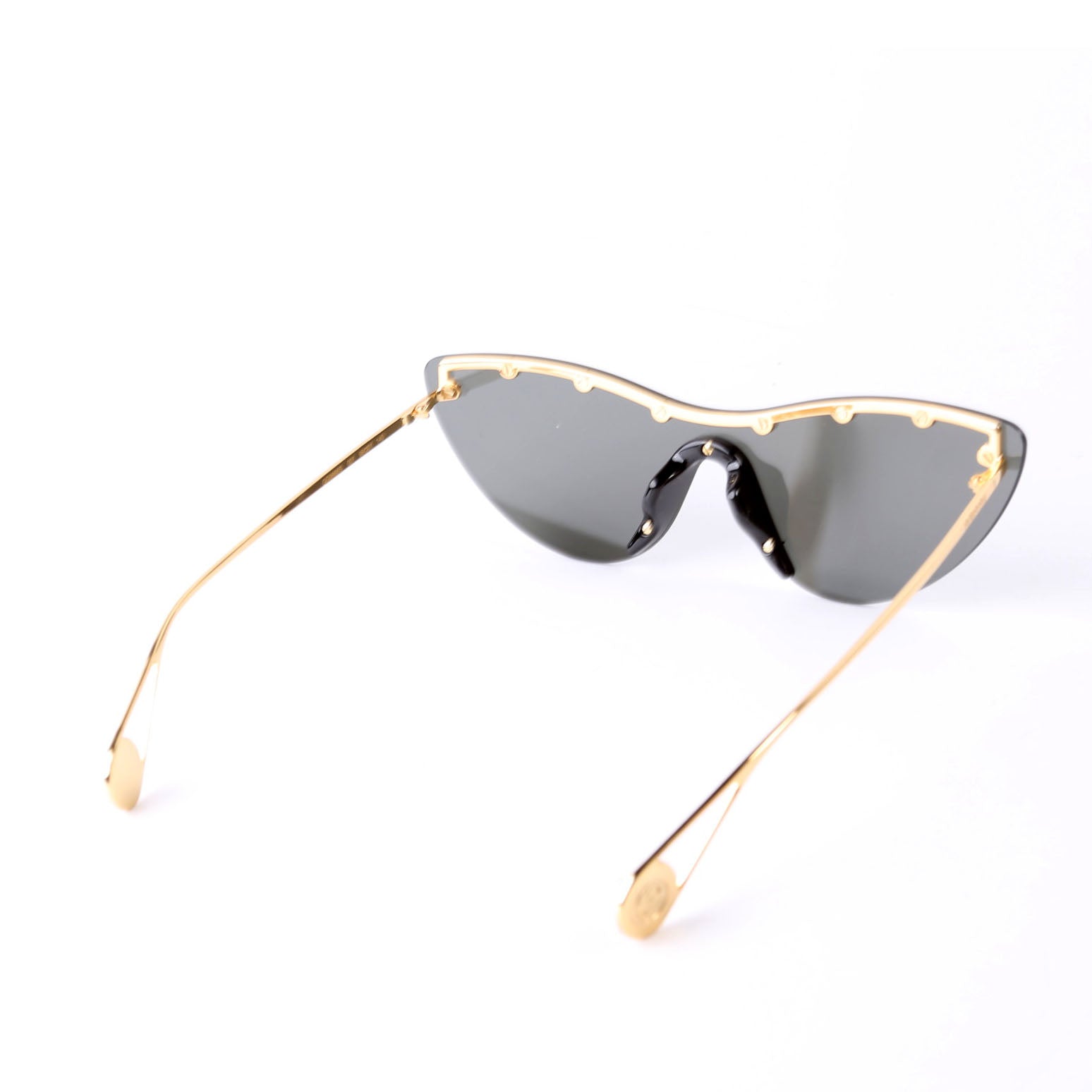 Sunglasses: GG066S Rimless Star Studded Cat Eye