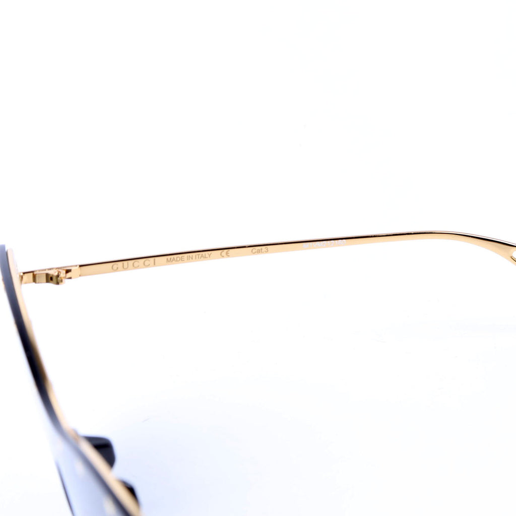 Sunglasses: GG066S Rimless Star Studded Cat Eye