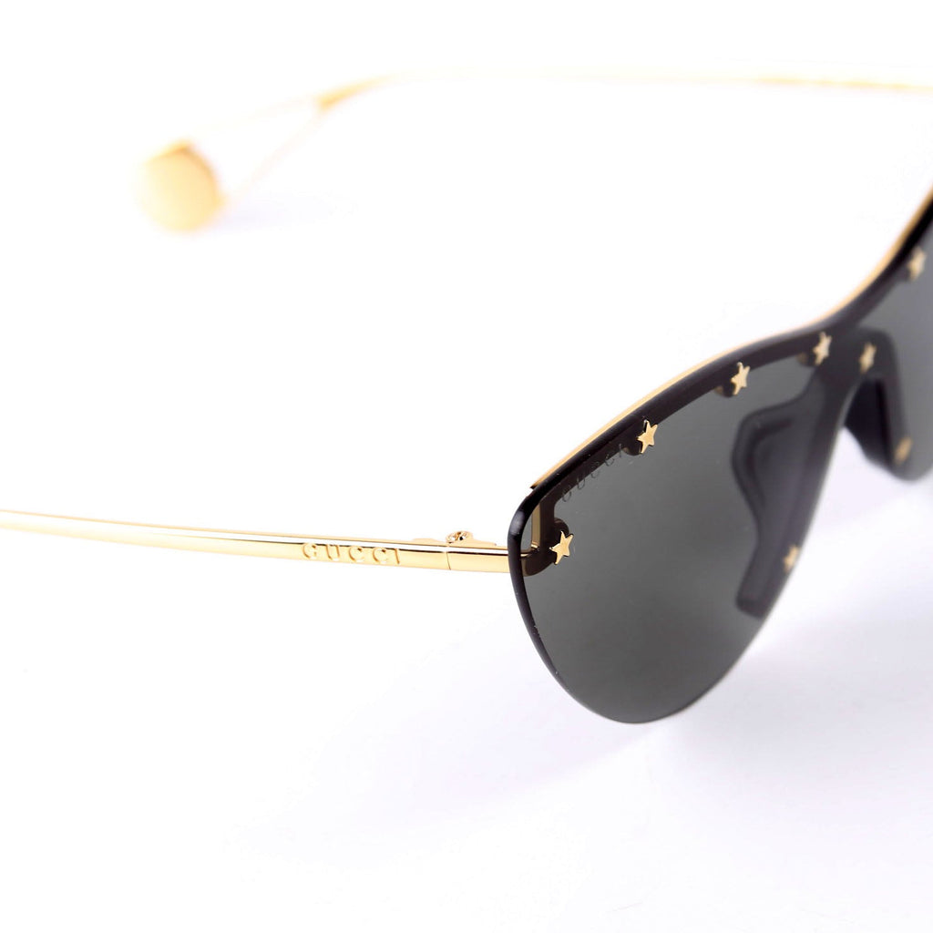 Sunglasses: GG066S Rimless Star Studded Cat Eye