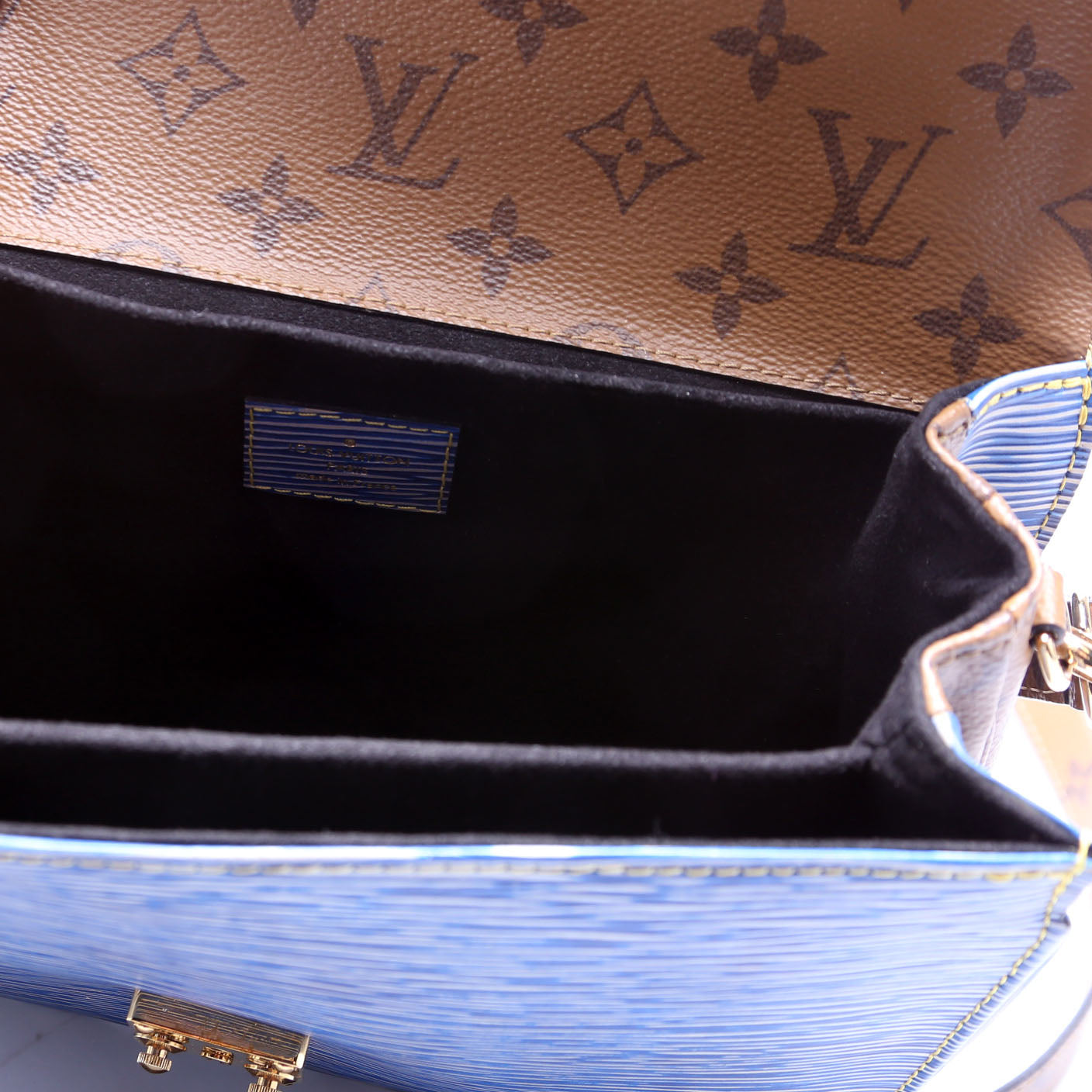 Pochette Metis Epi/Reverse Monogram