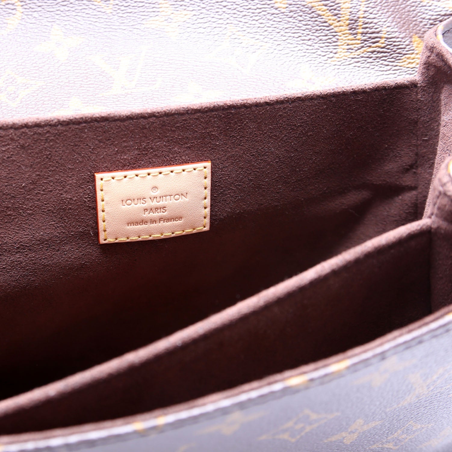 Pochette Metis Monogram