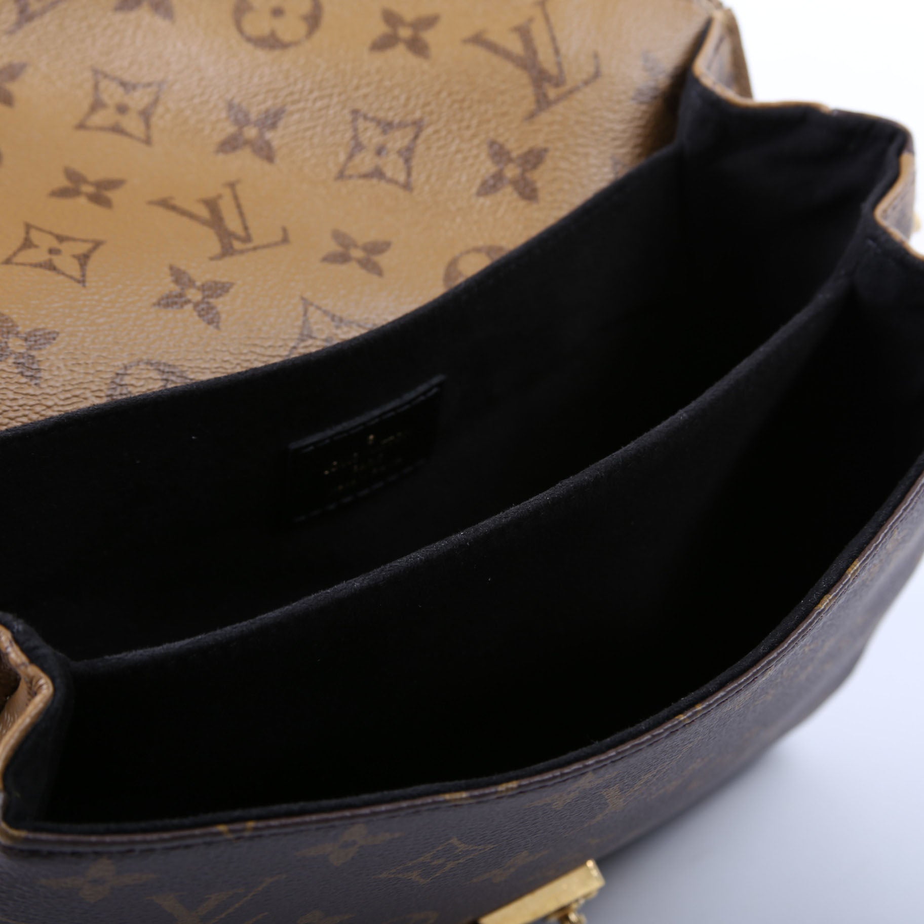 Pochette Metis Reverse Monogram