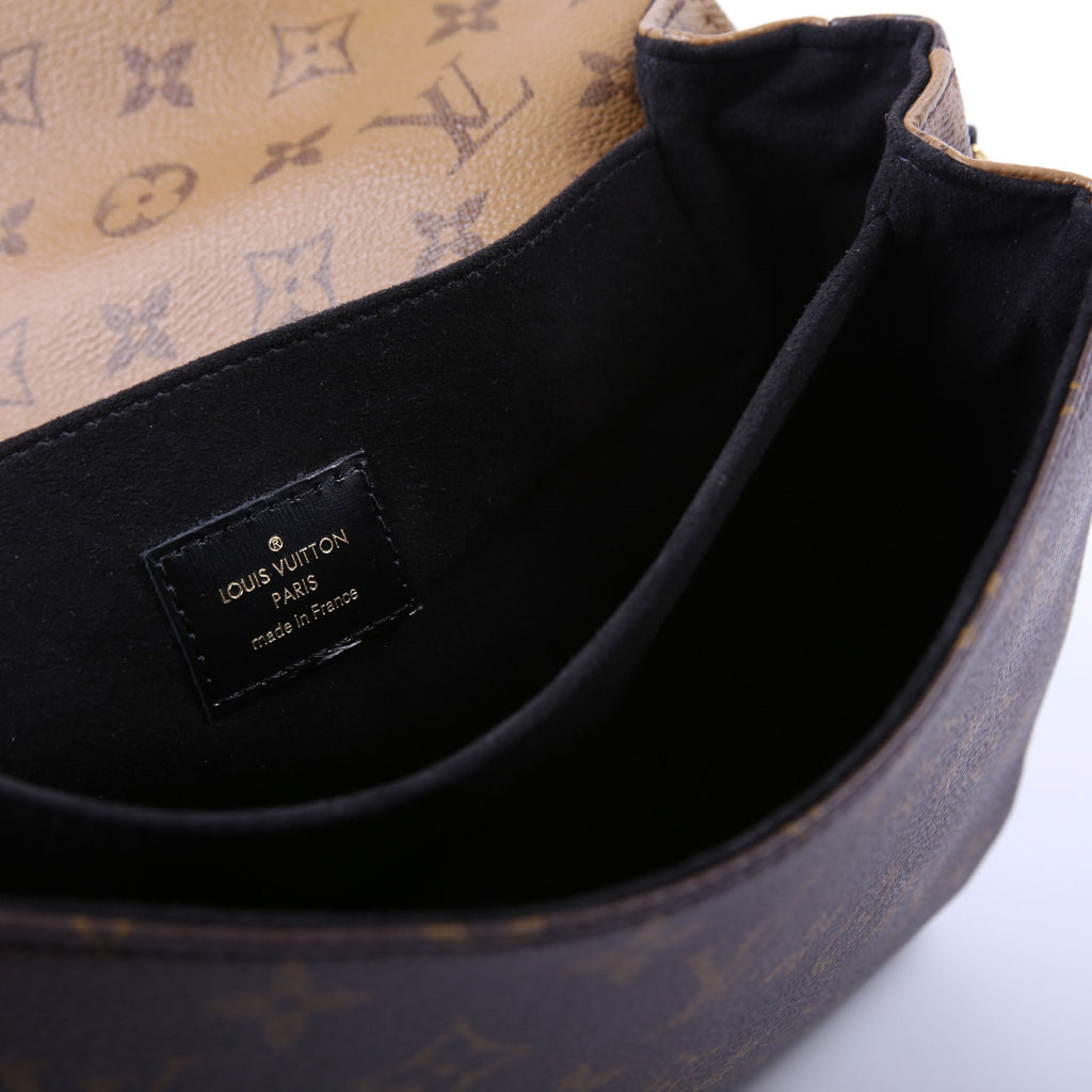 Pochette Metis Reverse Monogram