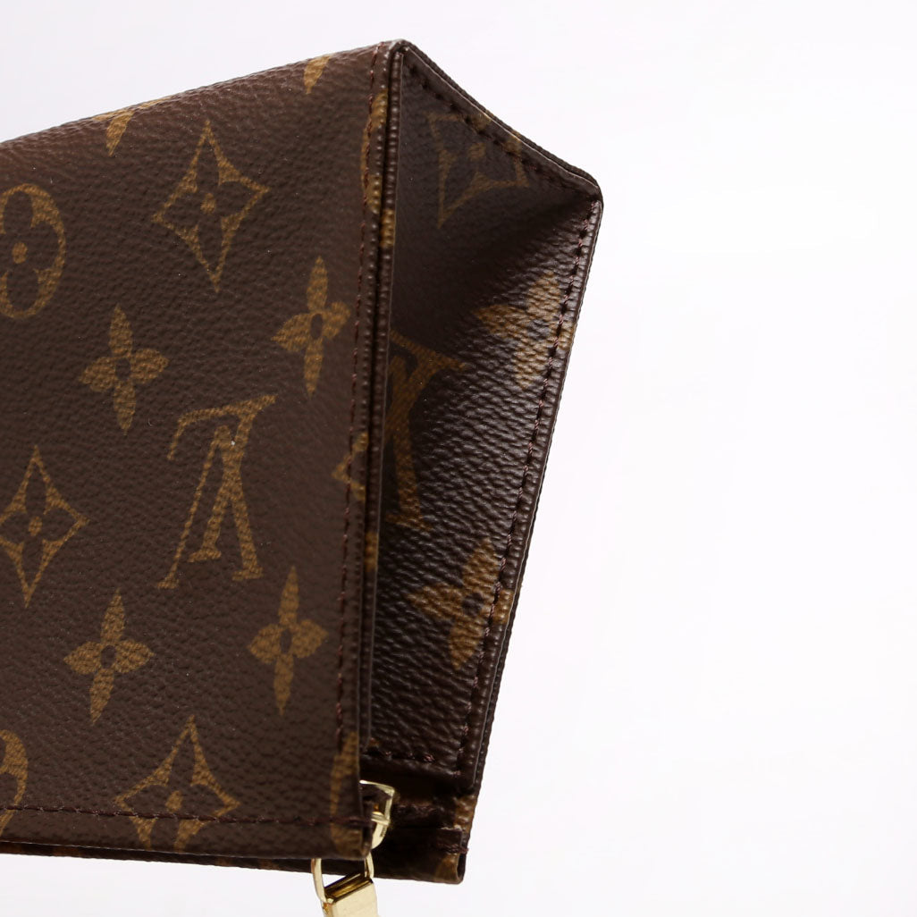 Toiletry Pouch 15 Monogram Newer