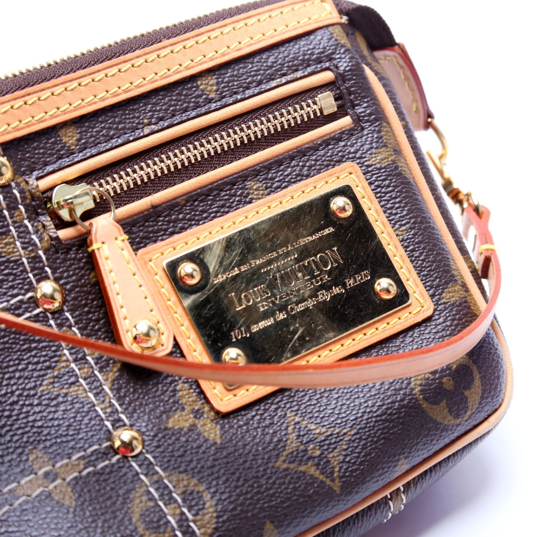 Riveting Pochette Access Monogram