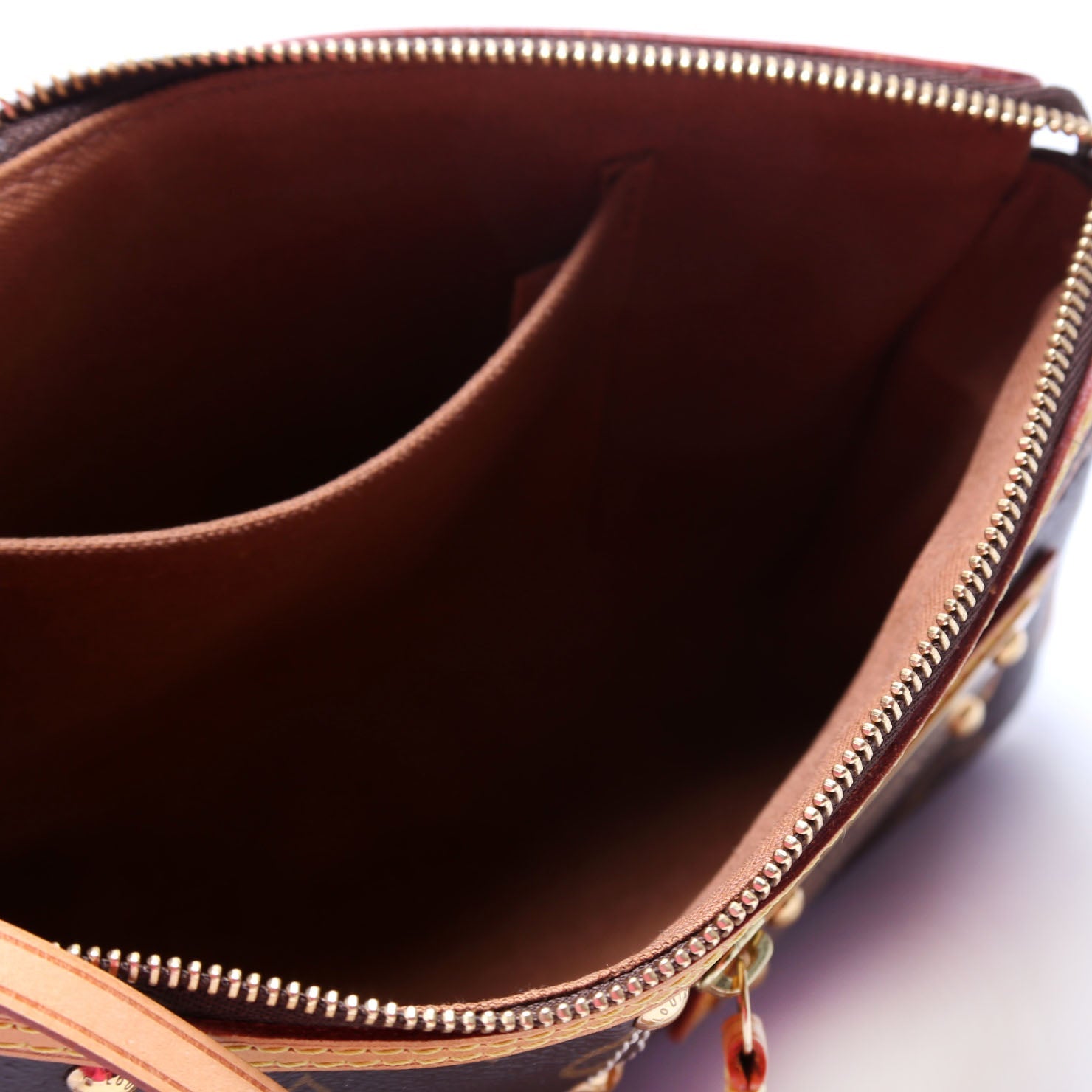 Riveting Pochette Access Monogram