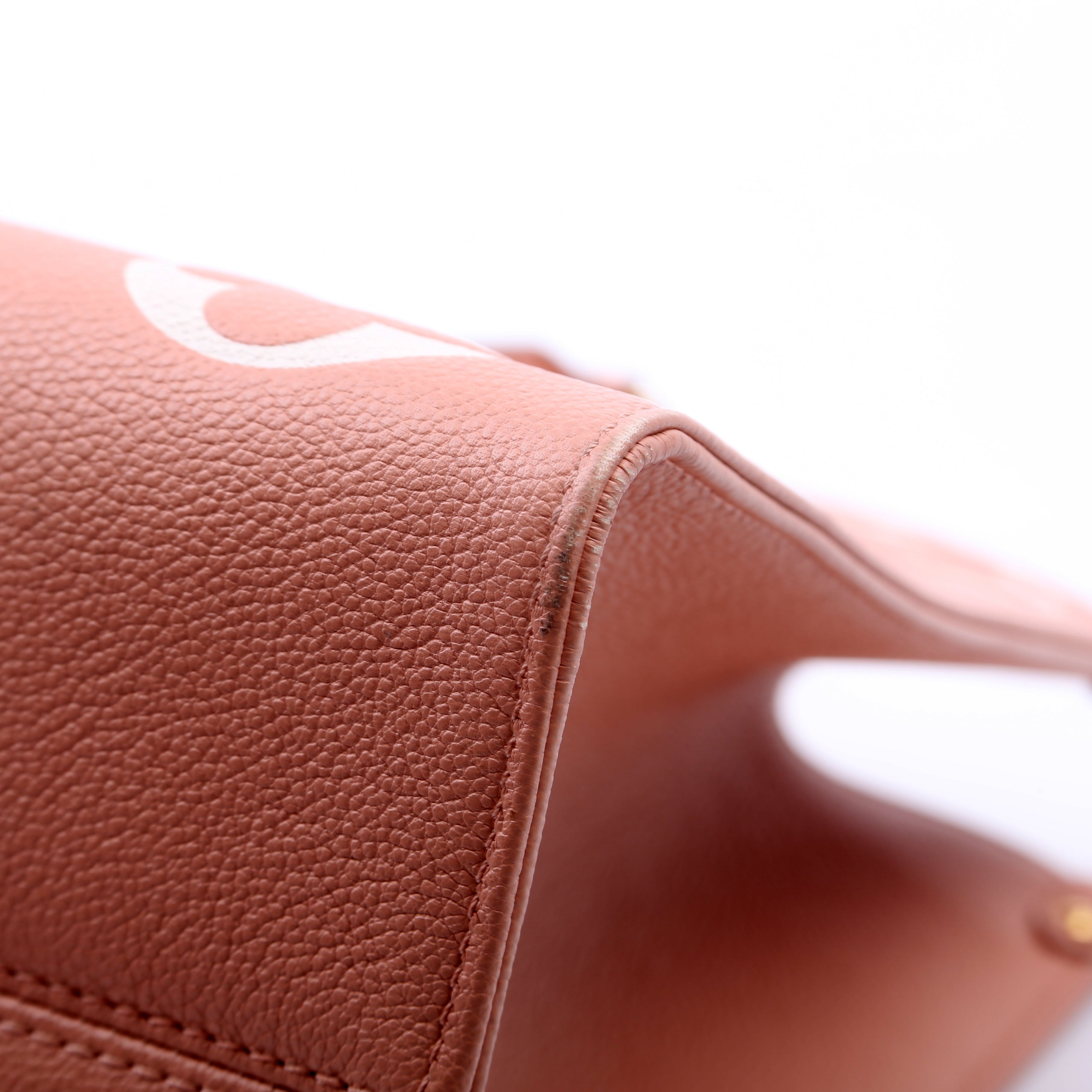 ONTHEGO MM Bicolor Empreinte Giant Monogram Pink
