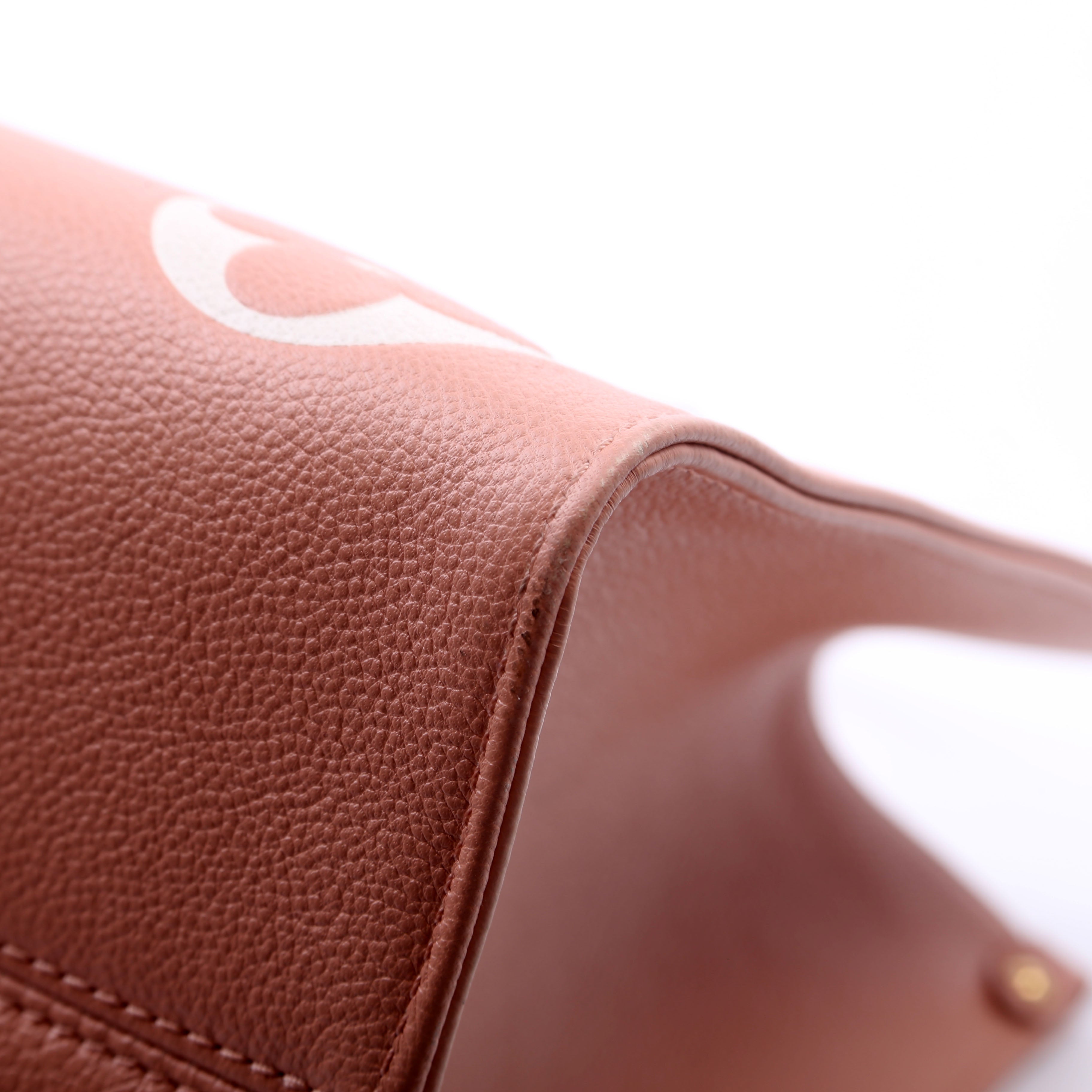 ONTHEGO MM Bicolor Empreinte Giant Monogram Pink