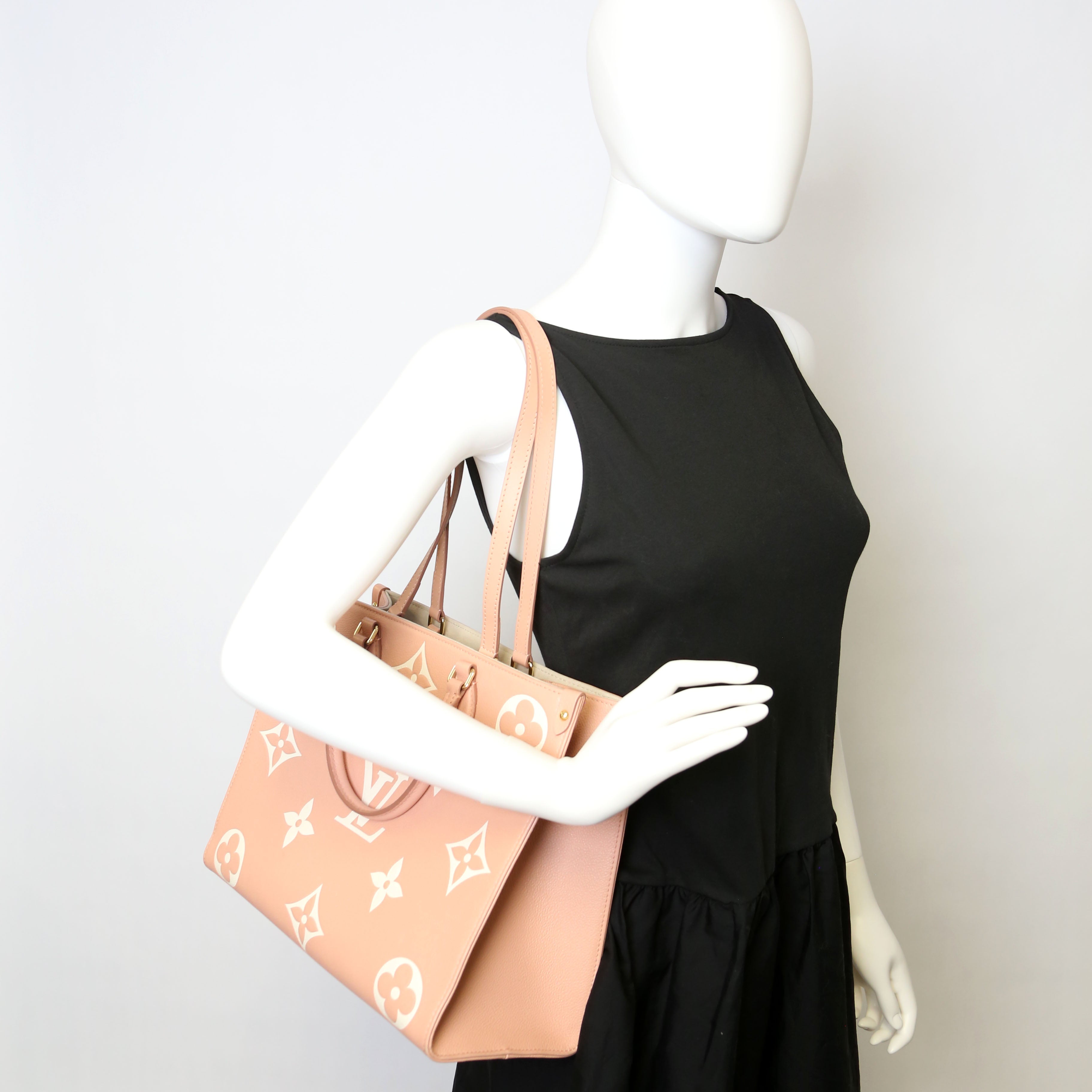 ONTHEGO MM Bicolor Empreinte Giant Monogram Pink