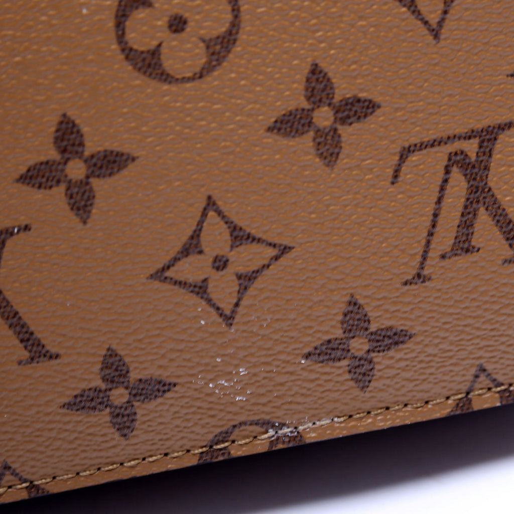 Pochette Metis Reverse Monogram