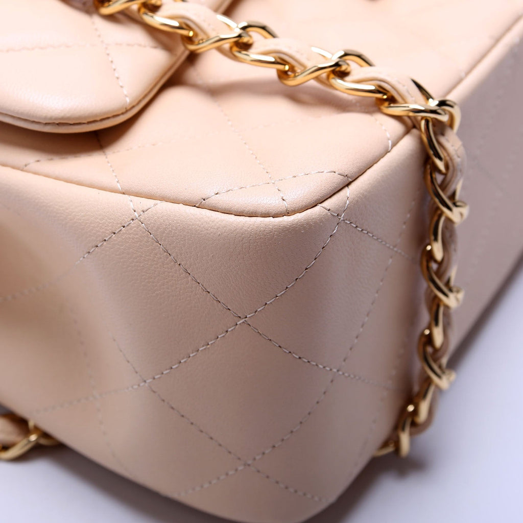 Classic Flap Jumbo Lambskin 24M Cream