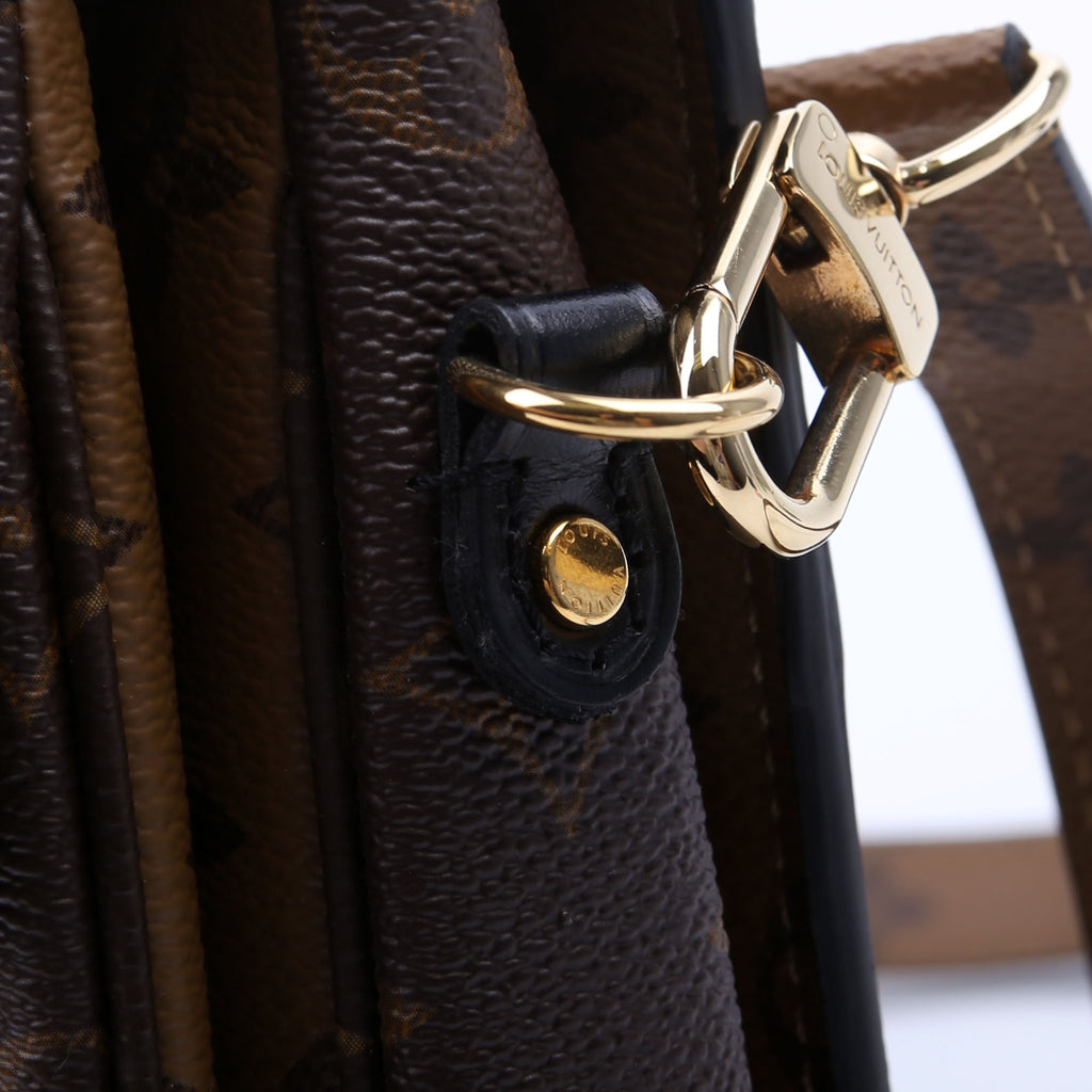 Pochette Metis Reverse Monogram