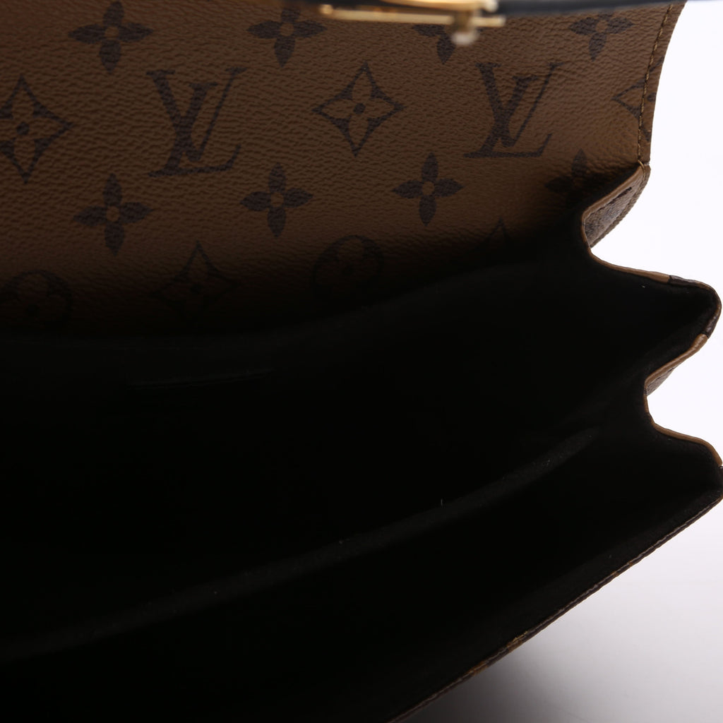 Pochette Metis Reverse Monogram