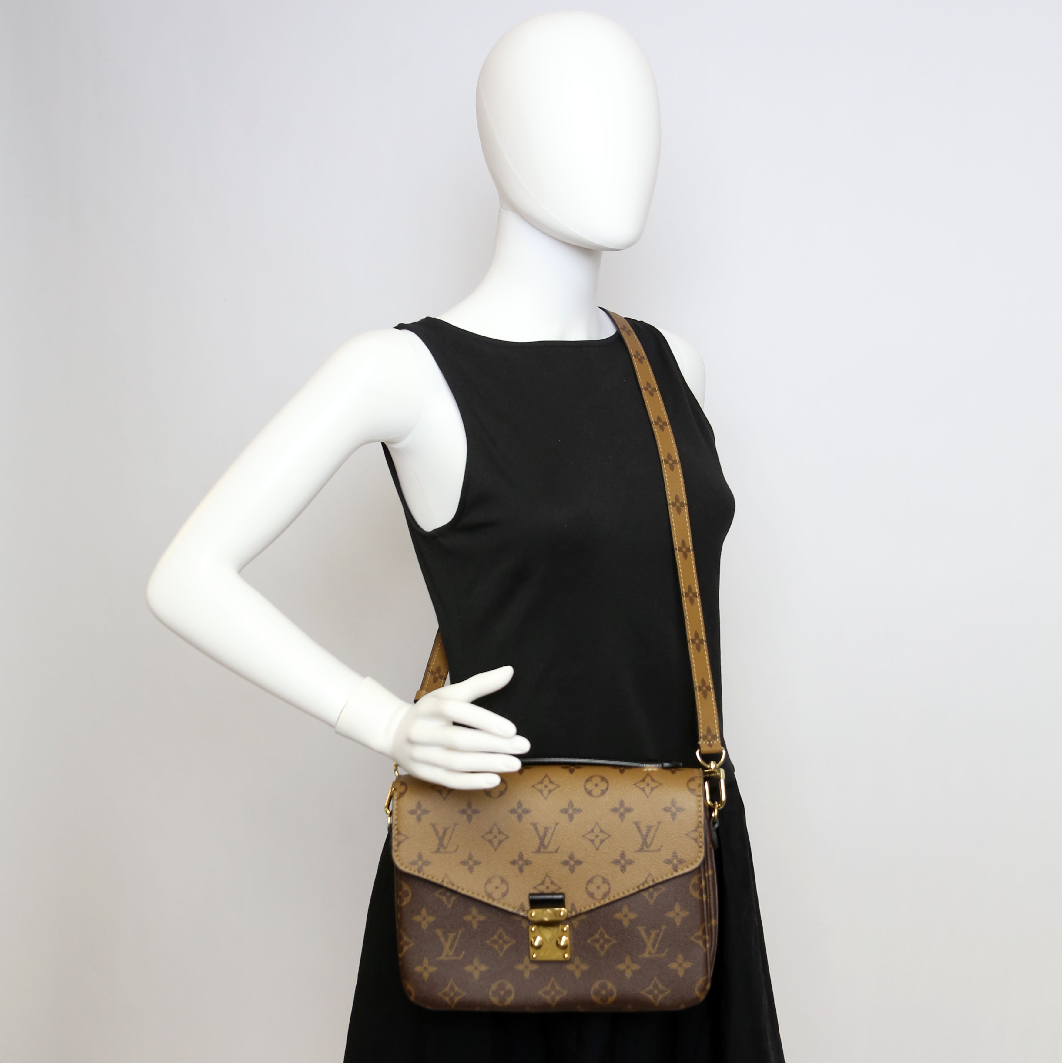 Pochette Metis Reverse Monogram