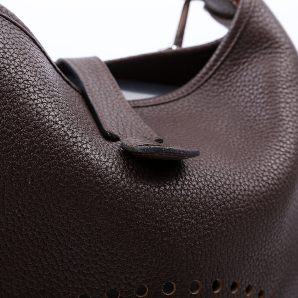 Evelyne III GM Brown