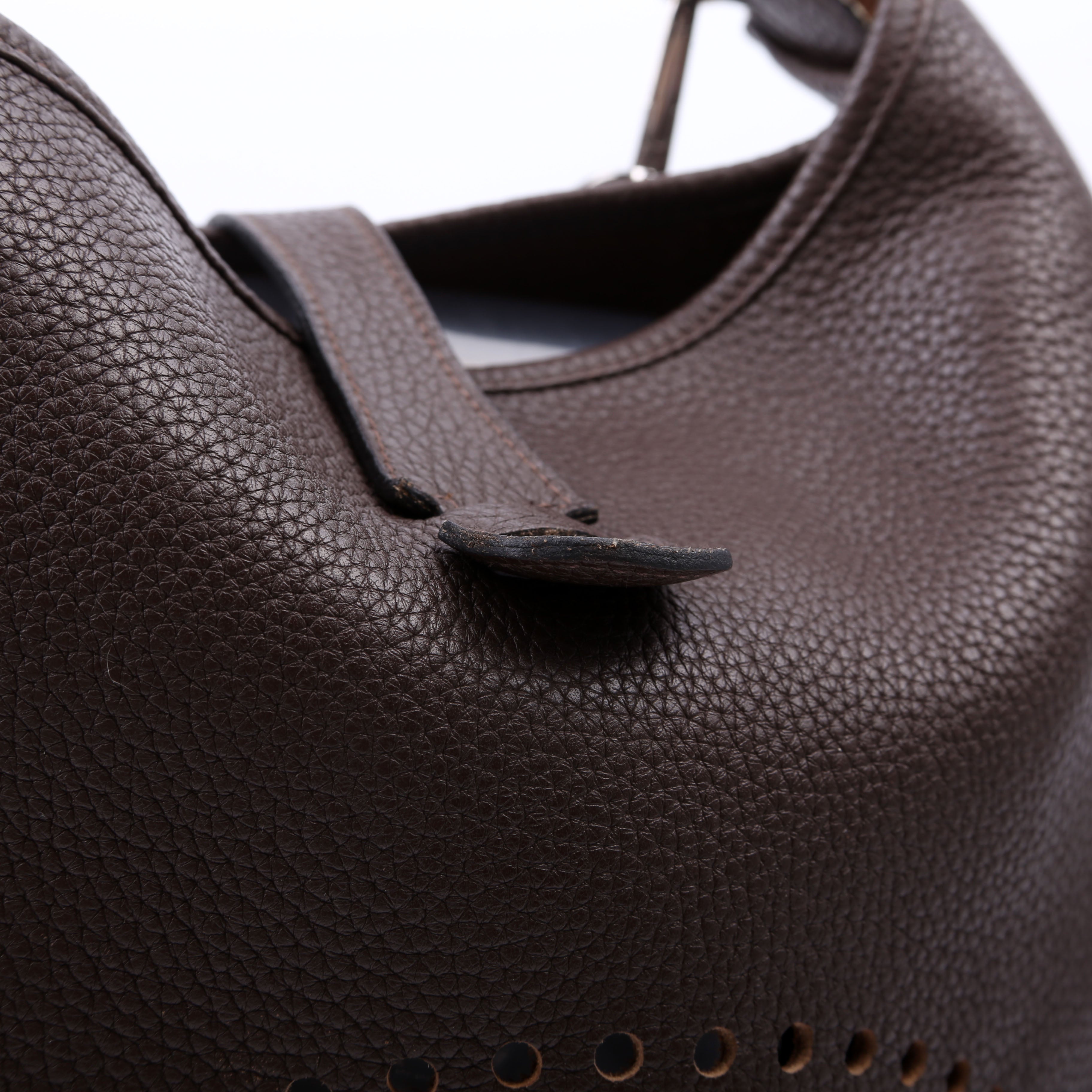 Evelyne III GM Brown