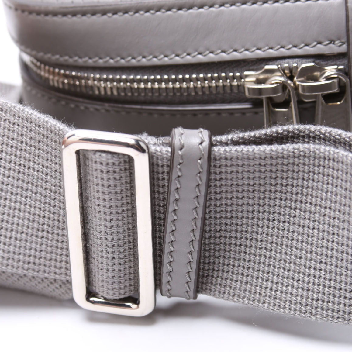 700431 GG Embossed Sling Backpack Gray