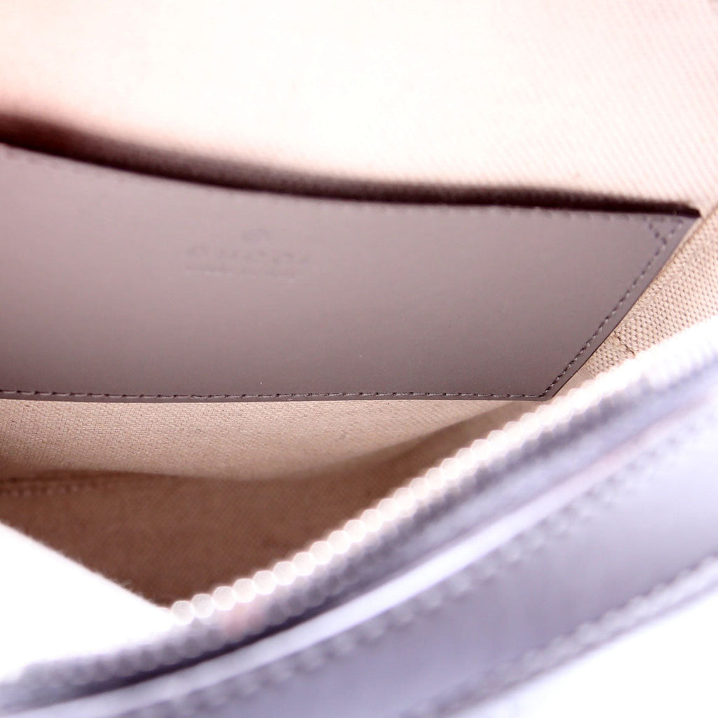 700431 GG Embossed Sling Backpack Gray