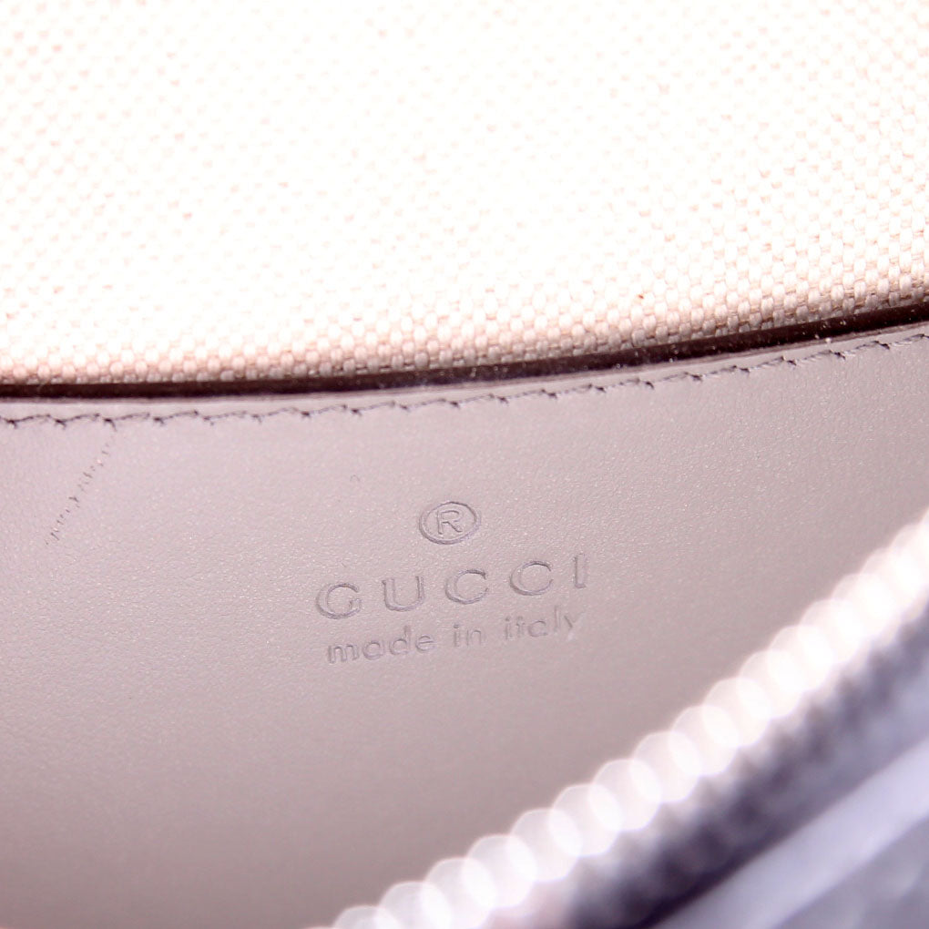 700431 GG Embossed Sling Backpack Gray