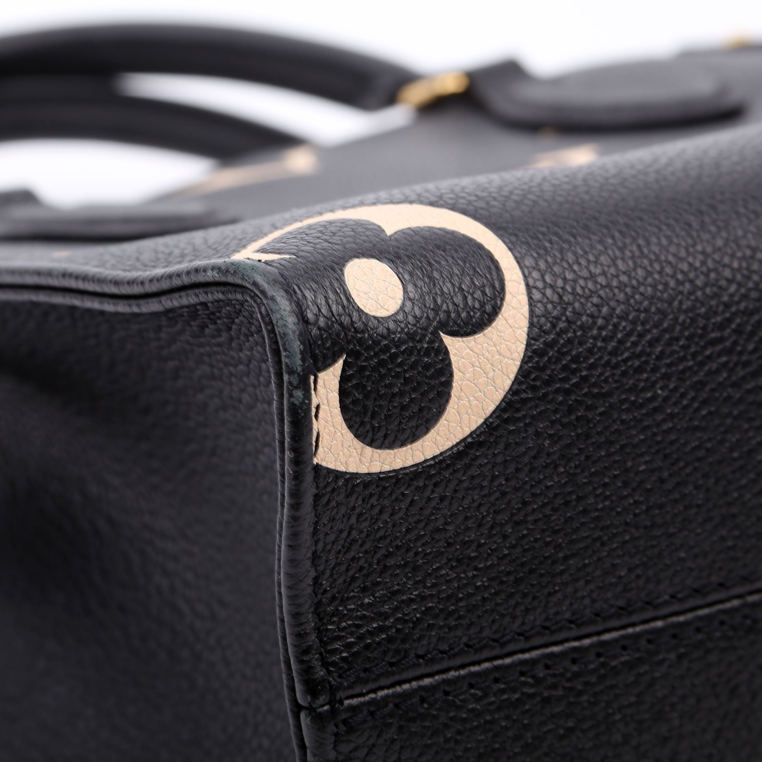 ONTHEGO PM Bicolor Empreinte Black/Cream