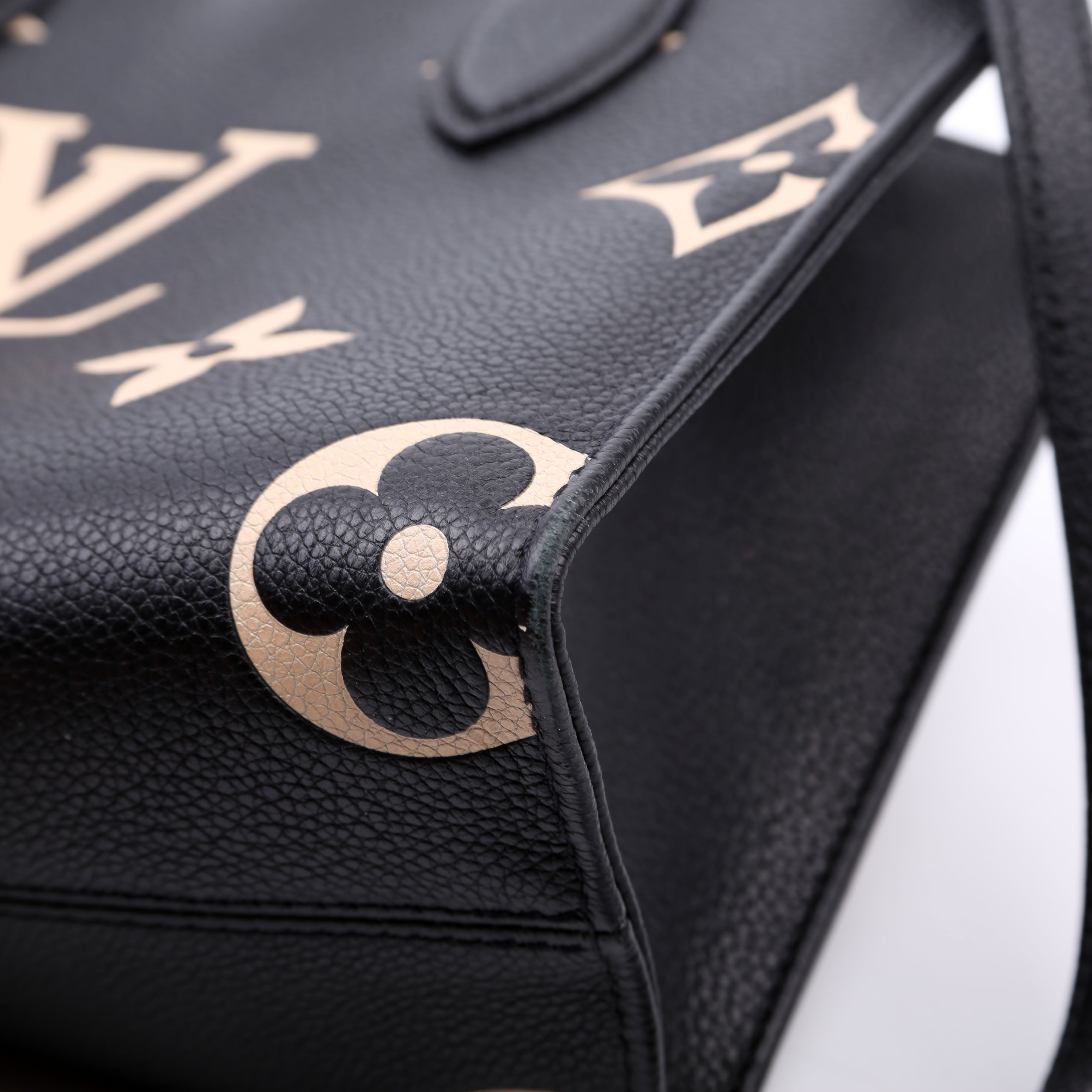 ONTHEGO PM Bicolor Empreinte Black/Cream