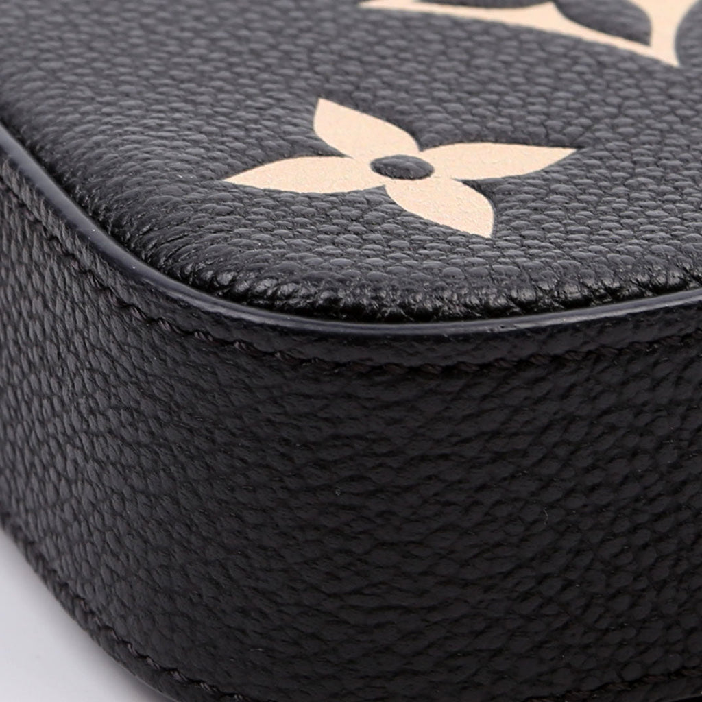 Pochette Felicie Bicolor Empreinte Black/Beige