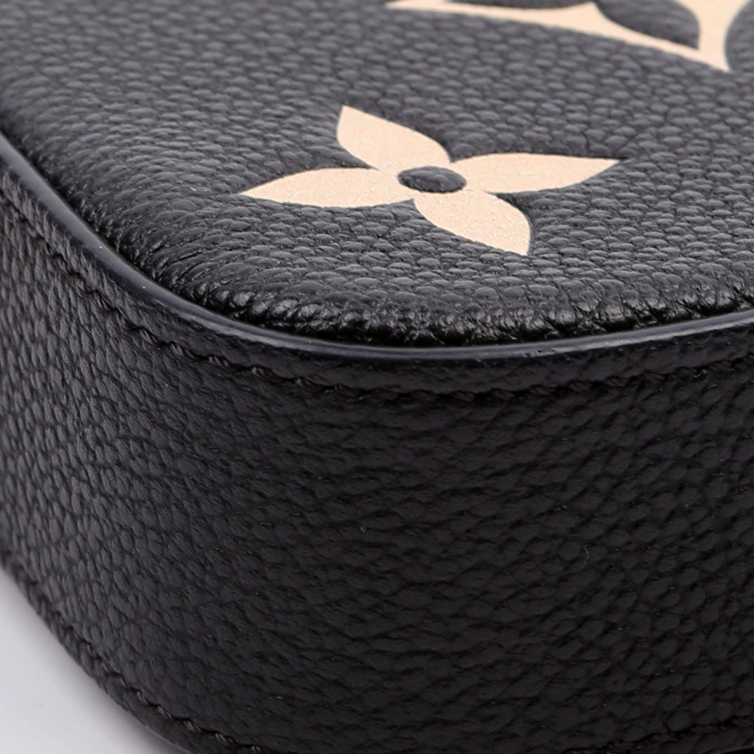 Pochette Felicie Bicolor Empreinte Black/Beige