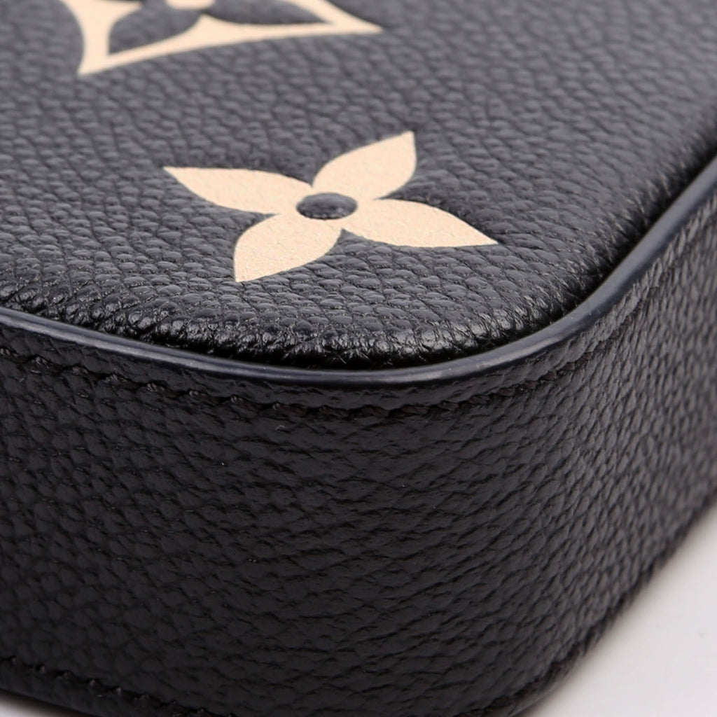 Pochette Felicie Bicolor Empreinte Black/Beige
