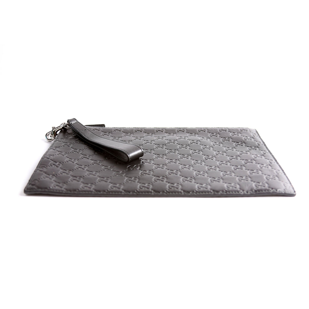 473963 Guccissima Zip Clutch Black